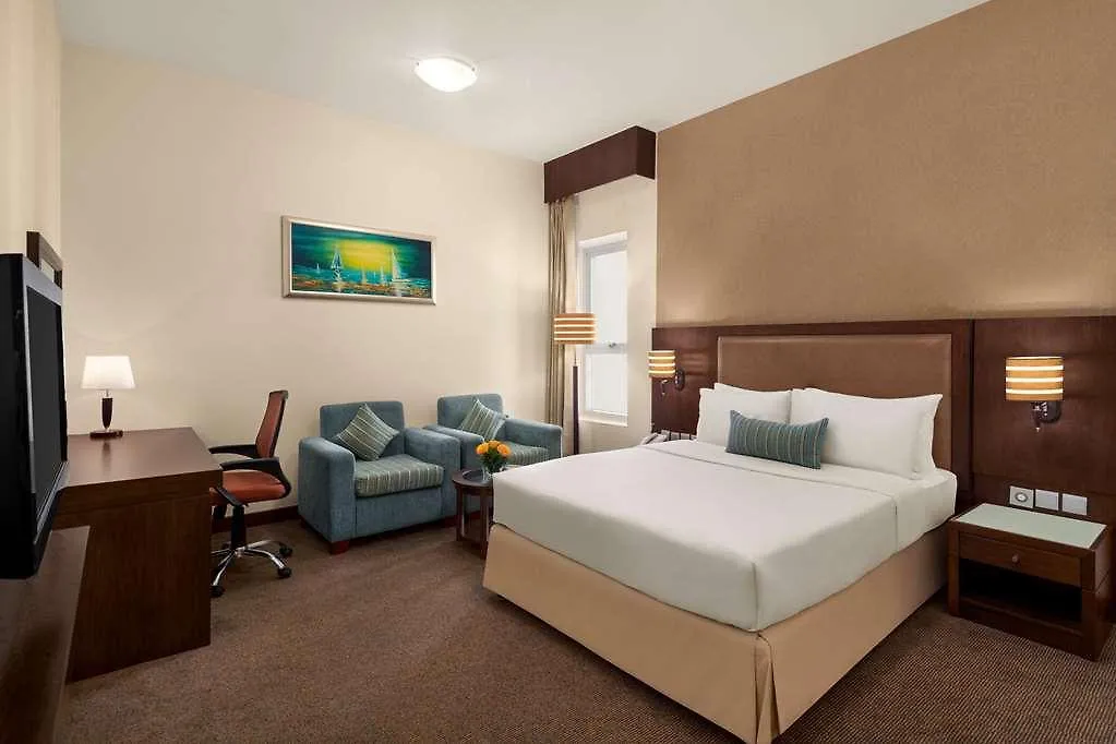 Отель Ramada By Wyndham Dubai Deira 4*,